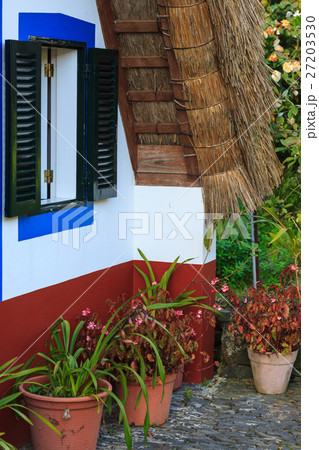 Typical old houses on Santana, Madeira island 27203530