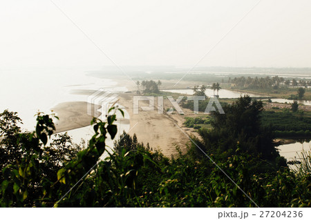 beautiful sandy beach with  view of the mountain 27204236