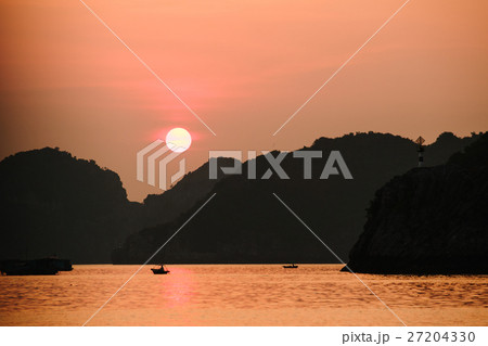 Asian fishing boats at sunset on a background of Asian fishing boats at sunset on a background of 27204330