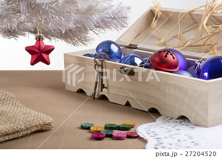 Red star and christmas balls in a box 27204520