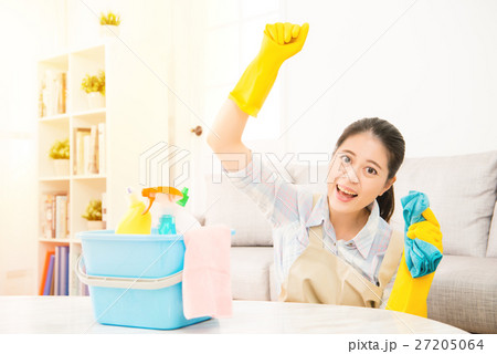 Happy woman celebrate finished cleaning Happy woman celebrate finished cleaning 27205064