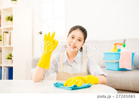 young housewife showing okay gesture done young housewife showing okay gesture done 27205065