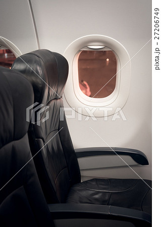 Airplane seats in the cabin ( Filtered image processed vintage effect. ) . 27206749