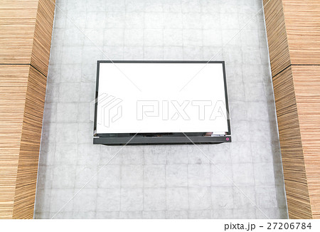 TV screen on wall . 27206784