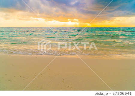 Beautiful sunset with sky over calm sea in tropical Maldives island . 27206941