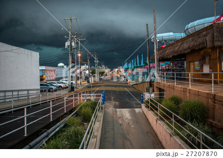 Dark clouds on the sky in the city street Dark clouds on the sky in the city street 27207870