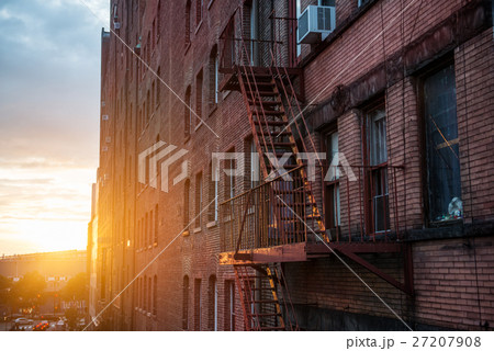 Fire Escape stairs on building wall in New York 27207908
