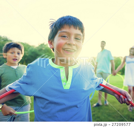 Hula Hoop Enjoying Cheerful Outdoors Leisure Concept 27209577
