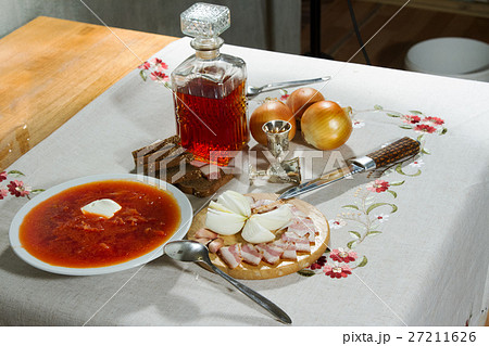 Carafe with alcohol tincture with snack stands on Carafe with alcohol tincture with snack stands on 27211626