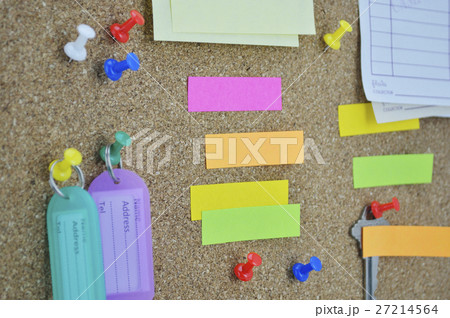 Sticky notes, pin, key and tag name on cork board Sticky notes, pin, key and tag name on cork board 27214564