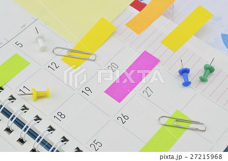 Post It notes with pin and clip on diary page 27215968