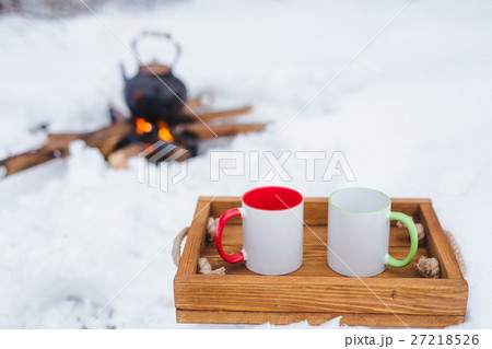 Winter picnic, kettle over an open fire 27218526