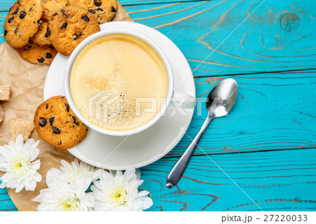 fresh cookies and coffee on wooden background fresh cookies and coffee on wooden background 27220033
