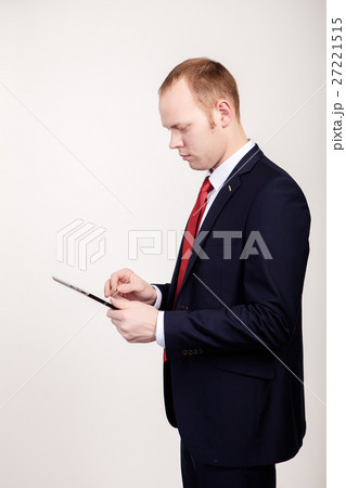 Businessman working with tablet in office, closeup 27221515