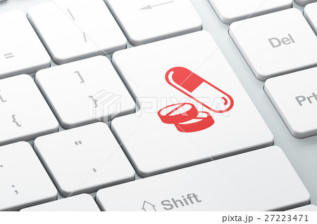 Health concept: Pills on computer keyboard 27223471