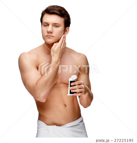 Handsome young man sniffing his armpit Handsome young man sniffing his armpit 27225195