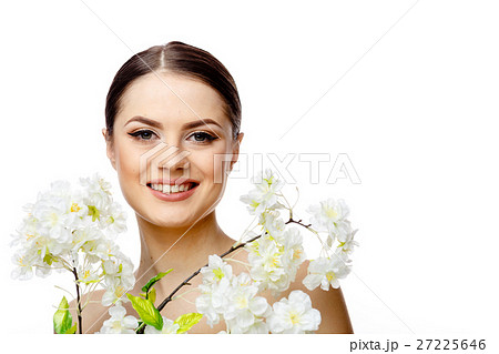 Beautiful Woman with Clean Fresh Skin holding Beautiful Woman with Clean Fresh Skin holding 27225646