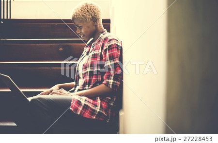 African Woman Laptop Social Networking Stairway Concept 27228453