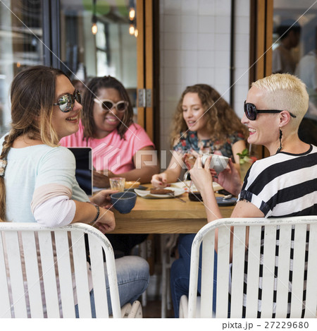 Young Women Drinking Coffee Concept Young Women Drinking Coffee Concept 27229680
