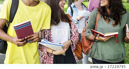 Diverse Young Students Book Outdoors Concept Diverse Young Students Book Outdoors Concept 27229795
