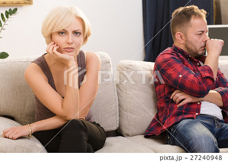 Offended couple man and woman at home 27240948