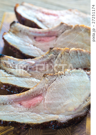Grilled pork ribs on the wooden board 27251174