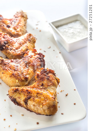 Fried chicken wings on the white plate 27251201