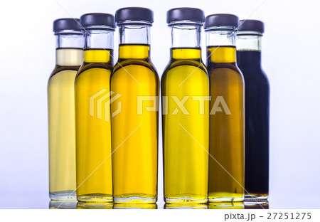 Bottles with different kinds of vegetable oil Bottles with different kinds of vegetable oil 27251275