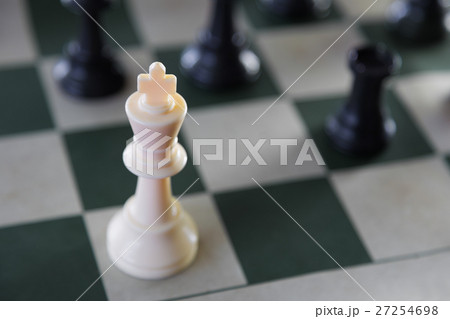White chess king surrounded 27254698