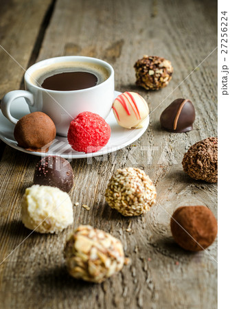 Luxury chocolate candies and cup of coffee Luxury chocolate candies and cup of coffee 27256224