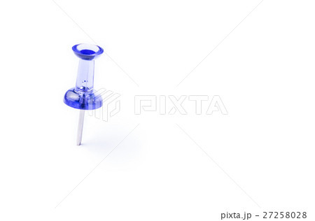 Blue translucent push pin on white paper 27258028
