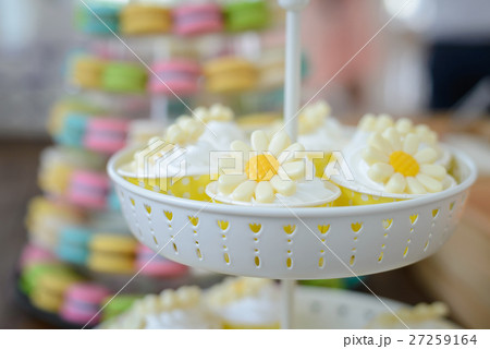 cupcakes with flower decorated on stand cupcakes with flower decorated on stand 27259164