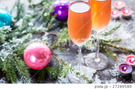 Two glasses of champagne with Christmas tree  27260580