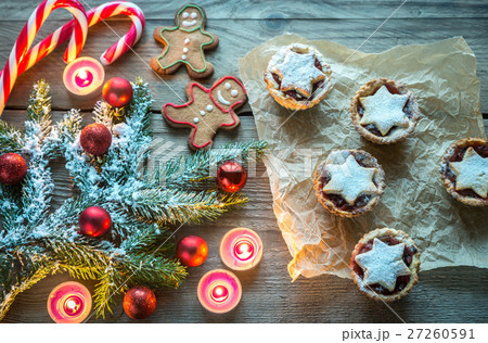 Decorated Christmas tree branch with pastry Decorated Christmas tree branch with pastry 27260591
