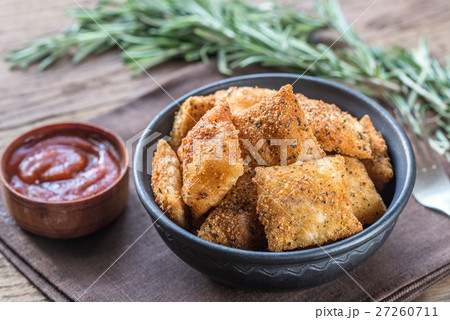 Plate with fried ravioli 27260711