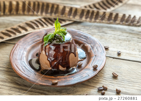Coffee panna cotta under chocolate topping 27260881