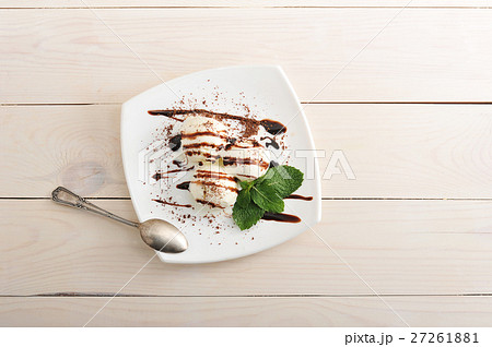 ice cream balls with chocolate and mint leaves ice cream balls with chocolate and mint leaves 27261881