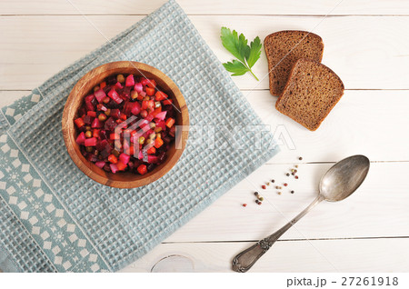 salad in a wooden bowl on a wooden background  27261918