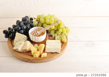 cheese plate - various types of cheese, grapes  27262066