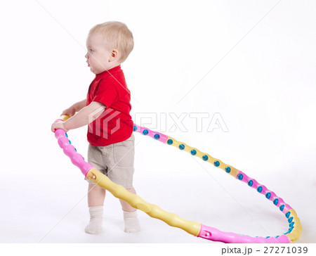 beautiful funny child plays with hoop beautiful funny child plays with hoop 27271039