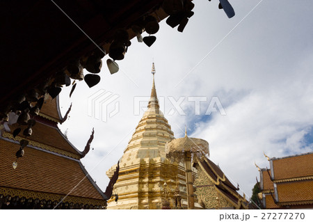 brass bell and golden pagodaat asian temple 27277270