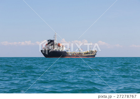 Cargo Ship over ocean skyline 27278767
