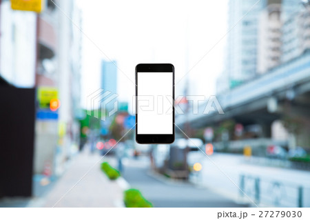 スマホ 携帯電話 スマートフォン 都市風景 東京 不動産イメージ スマホ 携帯電話 スマートフォン 都市風景 東京 不動産イメージ 27279030