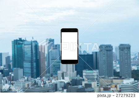 スマホ 携帯電話 スマートフォン 都市風景 東京 不動産イメージ スマホ 携帯電話 スマートフォン 都市風景 東京 不動産イメージ 27279223