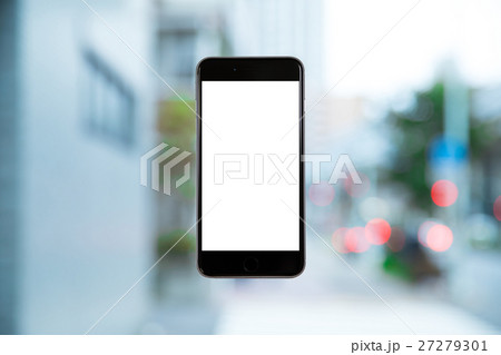 スマホ　携帯電話　スマートフォン　都市風景　東京　不動産イメージ 27279301