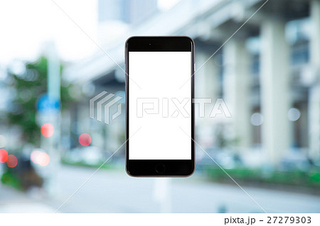 スマホ　携帯電話　スマートフォン　都市風景　東京　不動産イメージ 27279303