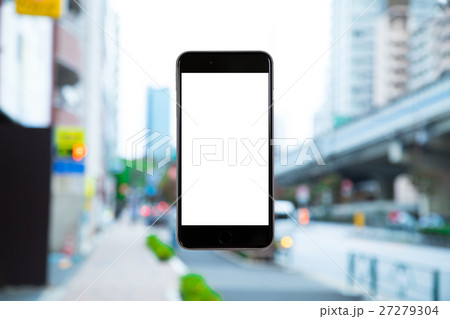 スマホ　携帯電話　スマートフォン　都市風景　東京　不動産イメージ 27279304