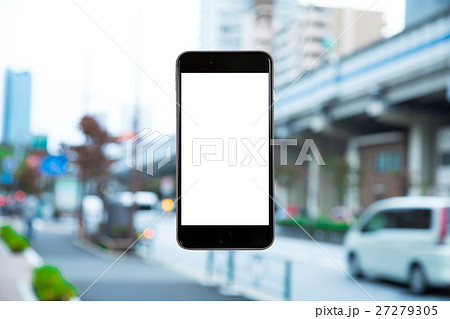 スマホ　携帯電話　スマートフォン　都市風景　東京　不動産イメージ 27279305