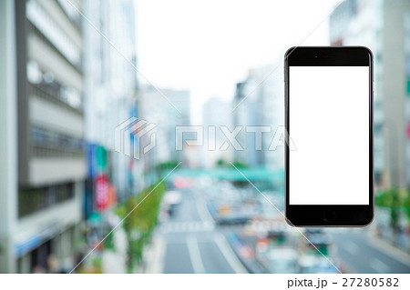 スマホ 携帯電話 スマートフォン 都市風景 東京 不動産イメージ スマホ 携帯電話 スマートフォン 都市風景 東京 不動産イメージ 27280582