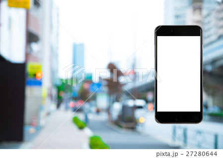 スマホ 携帯電話 スマートフォン 都市風景 東京 不動産イメージ スマホ 携帯電話 スマートフォン 都市風景 東京 不動産イメージ 27280644